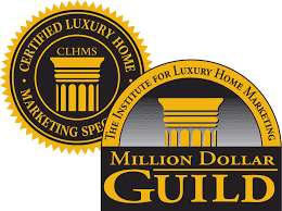 A logo for the million dollar guild and certified luxury home marketing specialists.